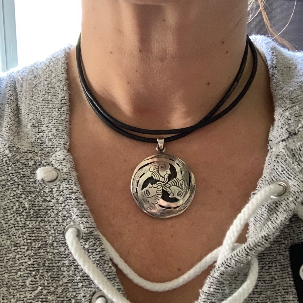 Celtic sterling silver medallion on leather chord!